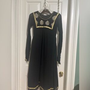 Beautiful three piece black and beige Salwar kameez . Long sleeves and long top